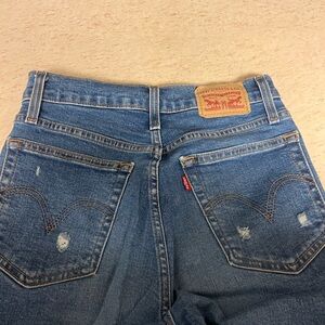 Levi's Classic Blue Jeans with Distressed Details